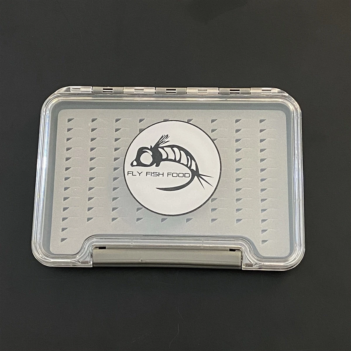 FLY FISH FOOD LOGO FLY BOX, CLEAR SINGLE SIDED - SMALL W/ EASY GRIP FOAM 1 FLY FISH FOOD LOGO FLY BOX, CLEAR SINGLE SIDED - SMALL W/ EASY GRIP FOAM